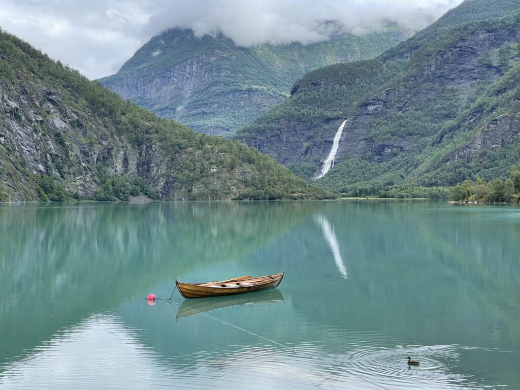 "Wittgenstein's boat" on Lake Eidsvatnet in Skjolden, Norway, with Wittgenstein's house above the shore in the background